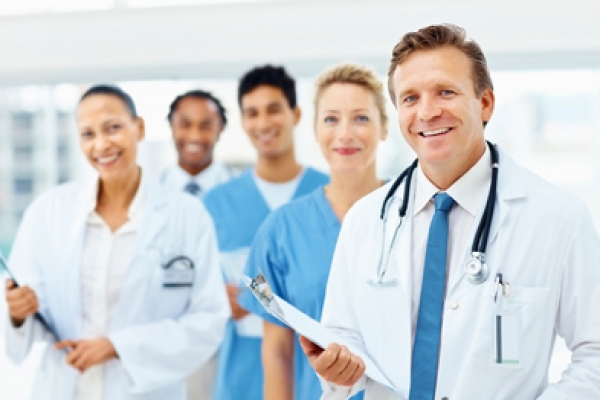 a group of doctors standing next to each other.